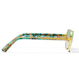 Sunglasses with a gold frame and multicolored arm on a white background