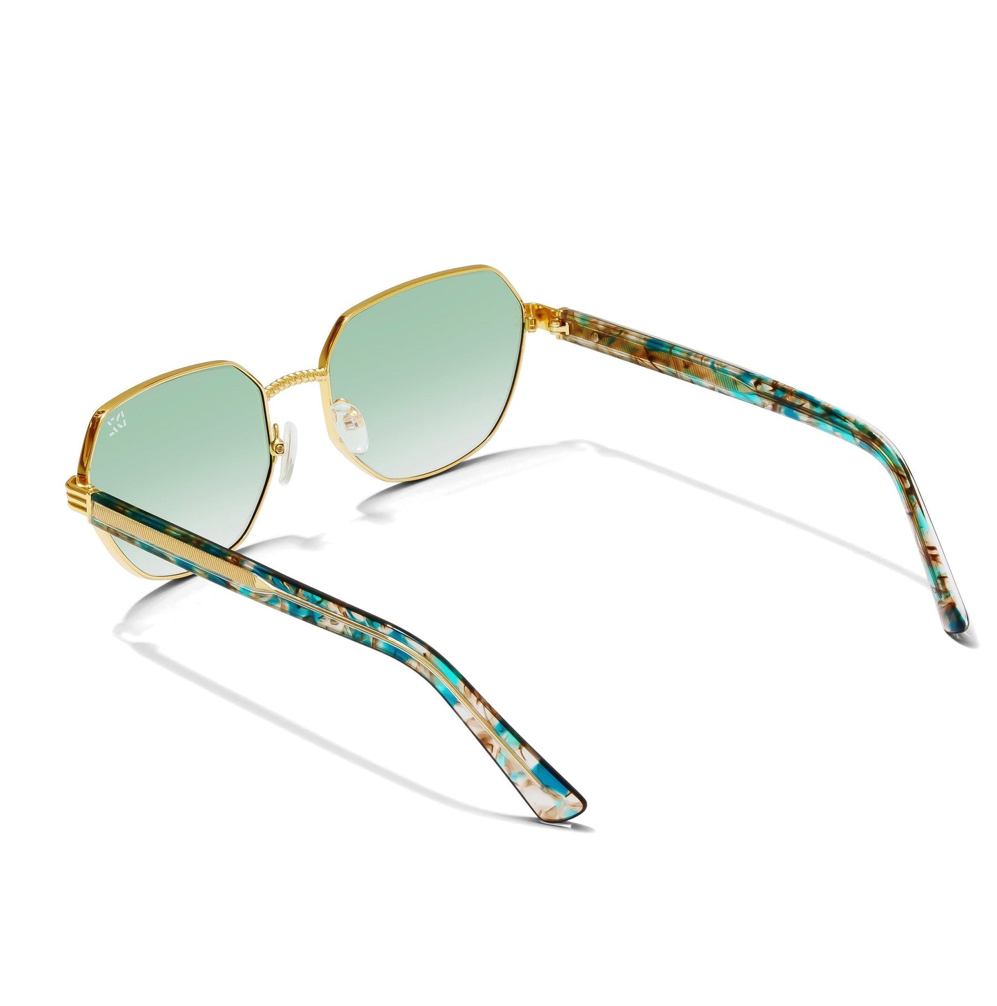 Sunglasses with gold frame and green-tinted lenses on a white background